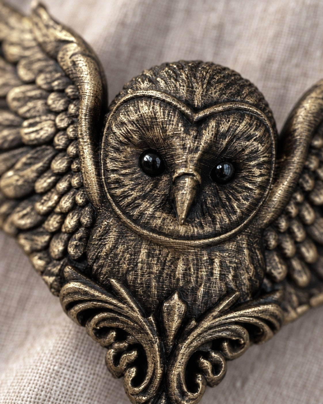 Close-up of the owl face and feathers, dry-brushed by hand